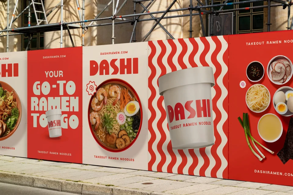 Outdoor advertising featuring Dashi Ramen bowls, takeout containers, and ingredients on white and red panels.