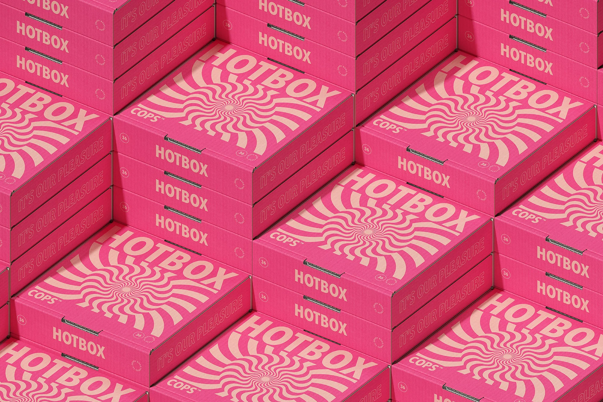 Stacks of pink and white patterned 'HOTBOX' containers create an abstract backdrop in this product or marketing shot.