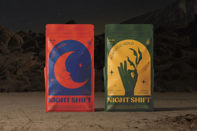 Two cannabis product packages stand side-by-side against a desert and night sky backdrop featuring illustrated designs and prominent branding.
