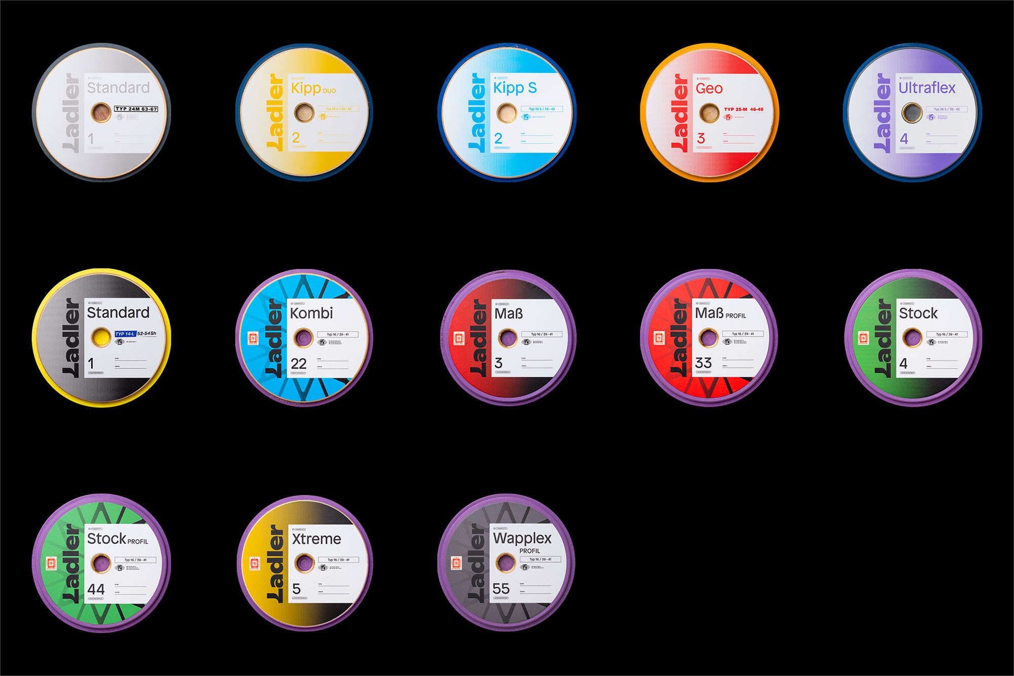 Collection of Ladler brand discs in various colors and designs, each featuring a label and number against a black background.