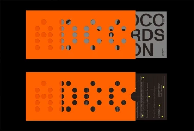 Orange perforated slipcases revealing grey and black graphic typography for the Advertising & Design Club of Canada brand identity.