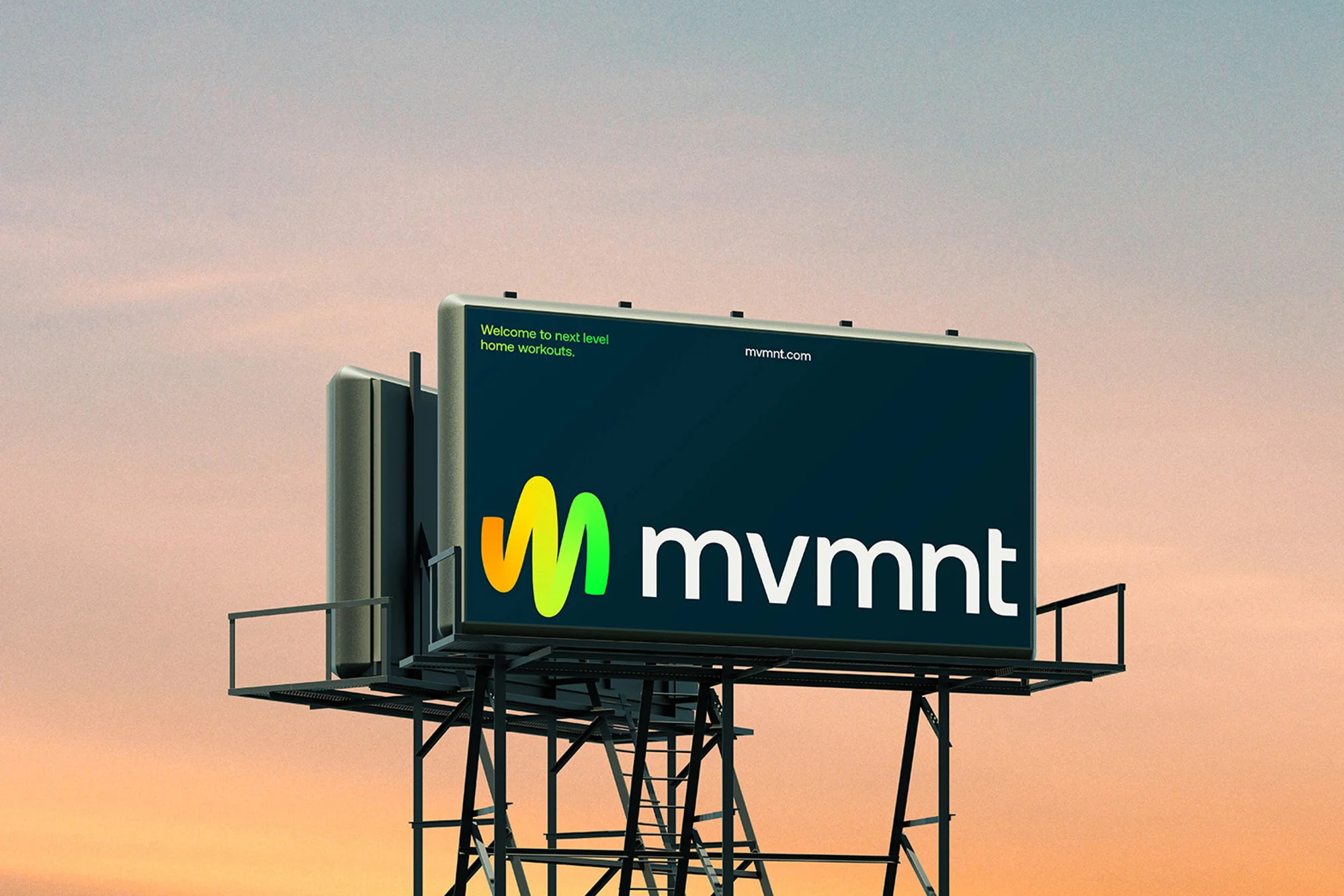 Billboard at sunset displaying the MVMT workout program logo.  The billboard is on a metal frame set against an orange and pink sky.