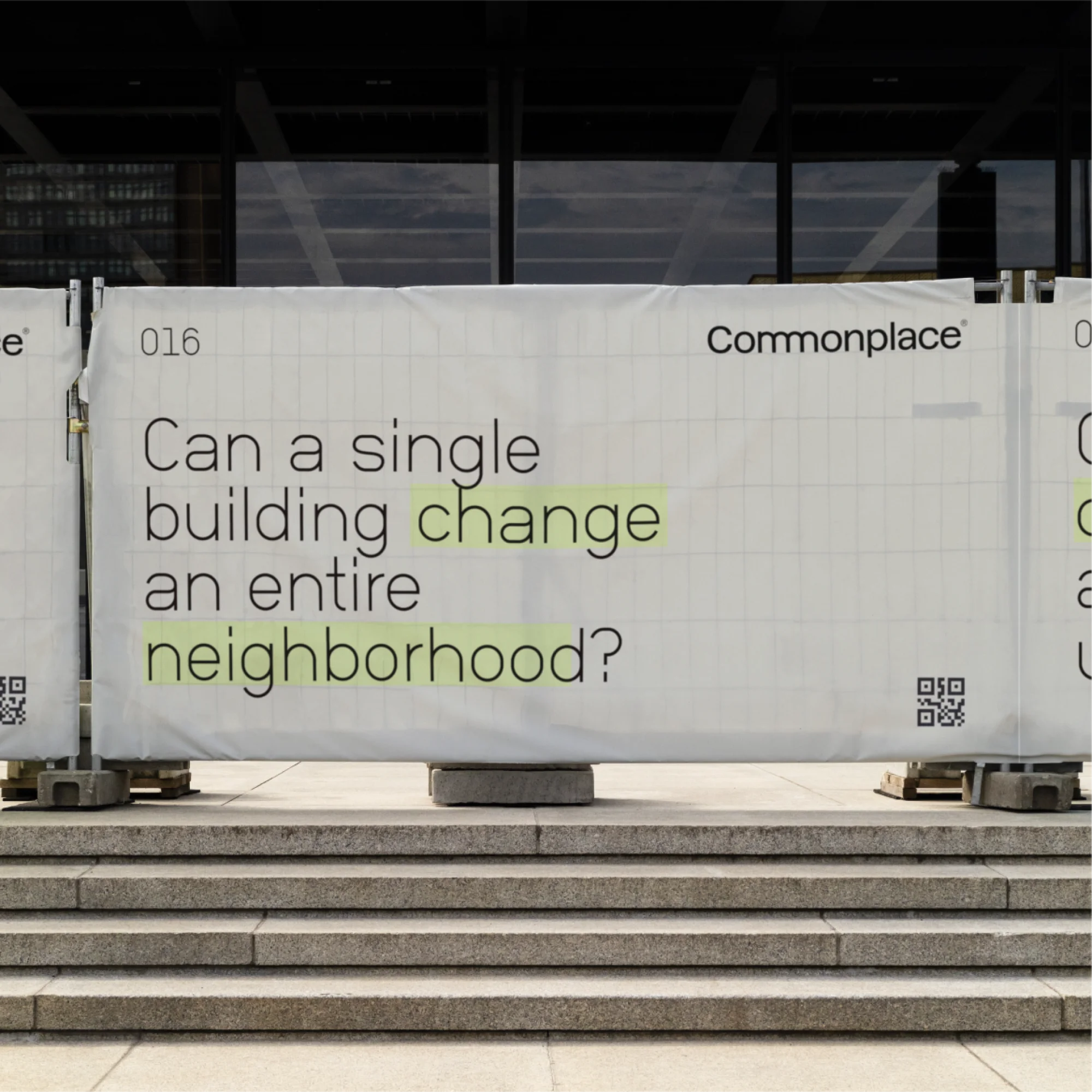 Building under construction, construction banner featuring the text 'Can a single building change an entire neighborhood?' on site.