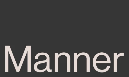 Manner brand identity typography with light cream text reading Manner on a dark grey background.