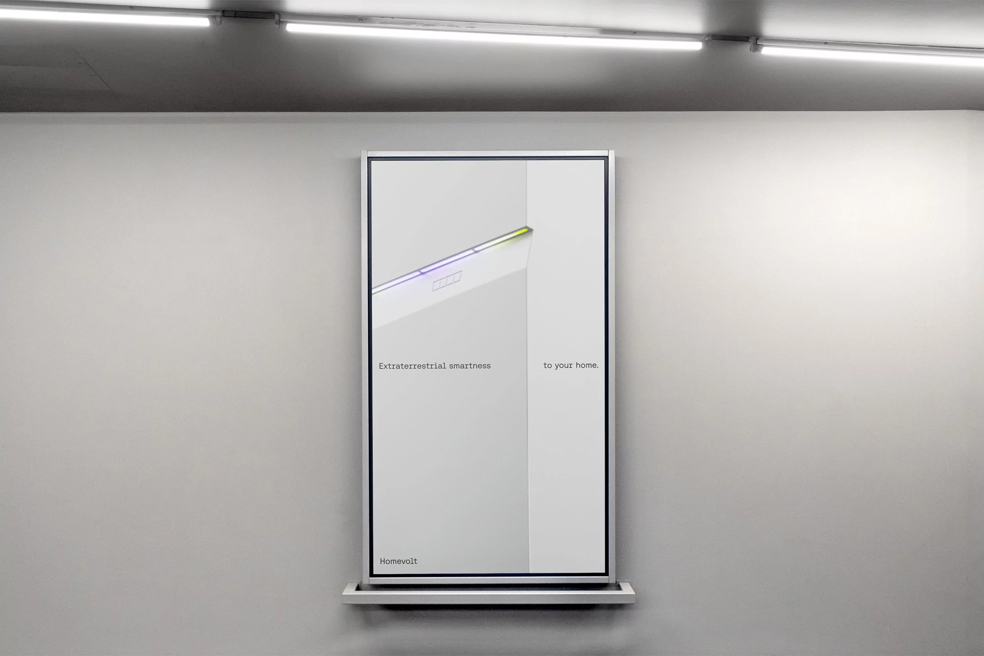 Framed advertisement for Homevolt featuring a minimalistic aesthetic with the text 'Extraterrestrial smartness to your home'.