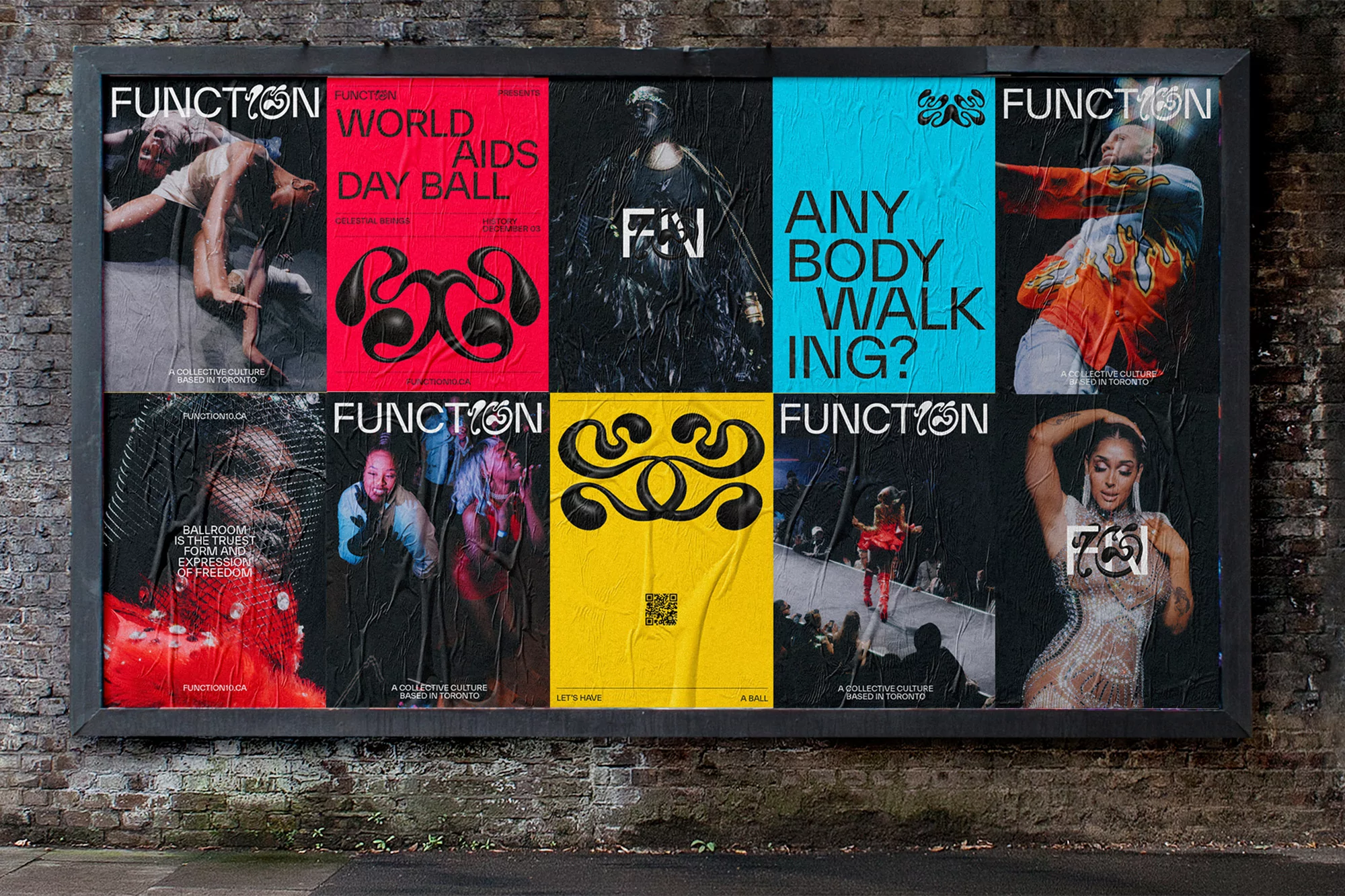 An array of wheatpaste posters featuring bold typography, photography, and graphic design mounted on a dark brick wall.