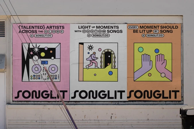 Three colorful Songlit posters on a wall, each featuring playful illustrations and promoting the music platform with the brand name.