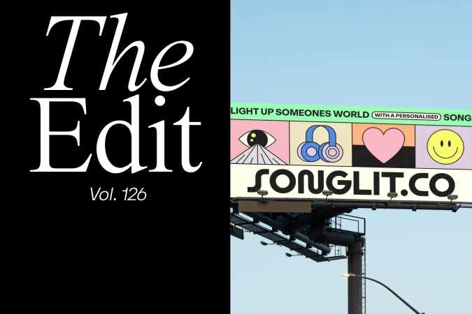 Billboard ad for Songlit featuring graphic icons of an eye, headphones, a heart, and a smiley face against a clear blue sky.