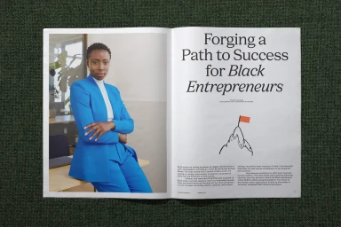 Open magazine spread featuring a Black woman in a blue suit on the left and bold typography about Black entrepreneurs on the right.