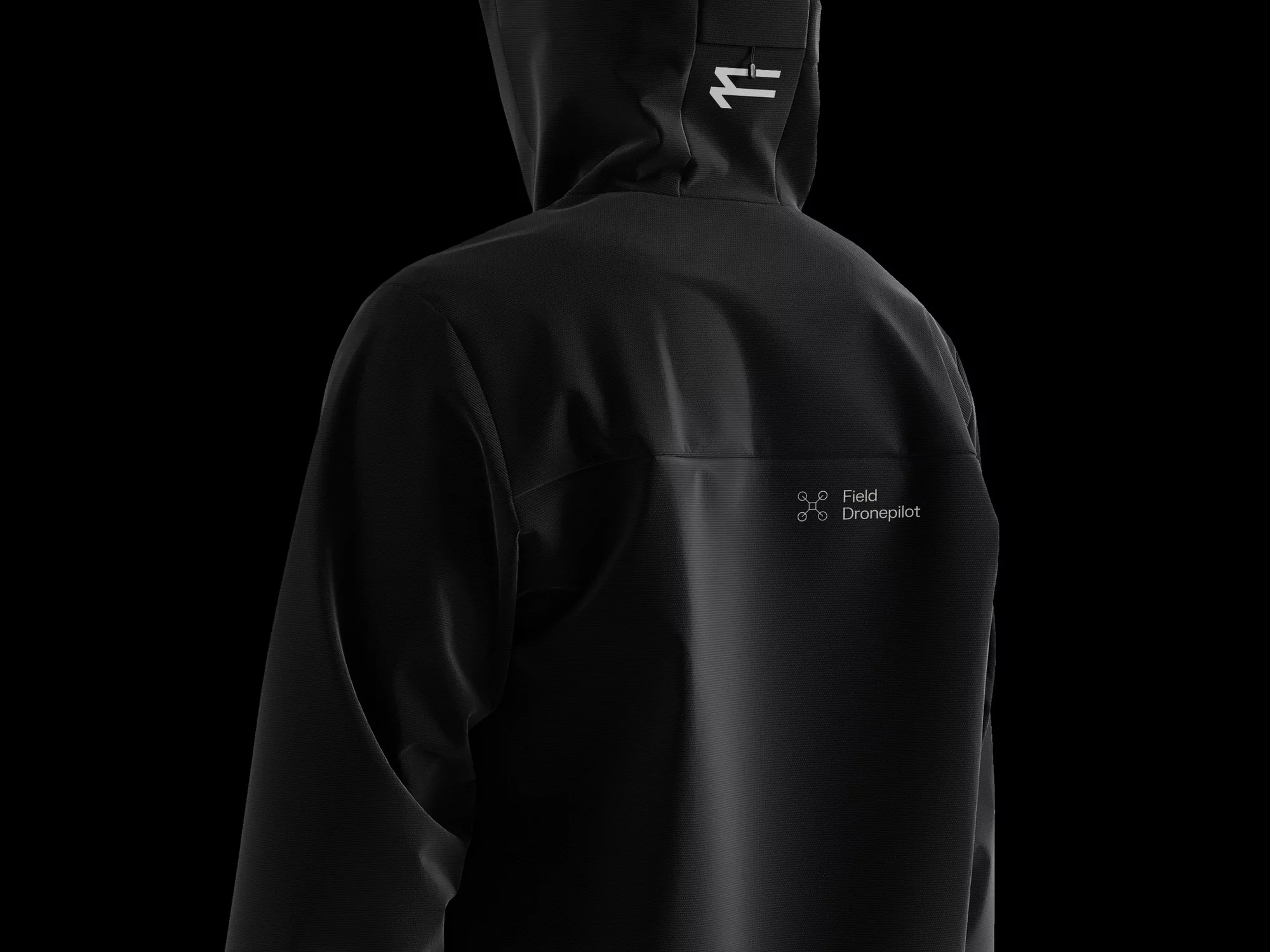 Black hooded jacket with subtle branding against a dark background, clean style. Ideal for active wear or urban fashion.