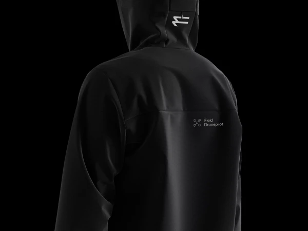 Black hooded jacket with subtle branding against a dark background, clean style. Ideal for active wear or urban fashion.