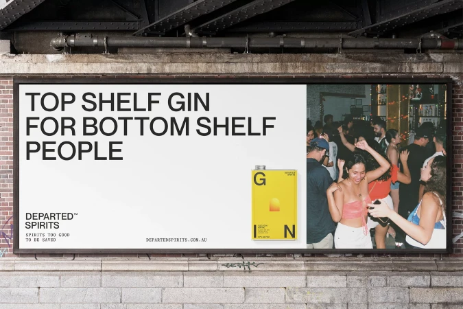 Billboard advertisement for Departed Spirits gin featuring party scene on brick wall under metal structure, promoting 'top shelf gin'.