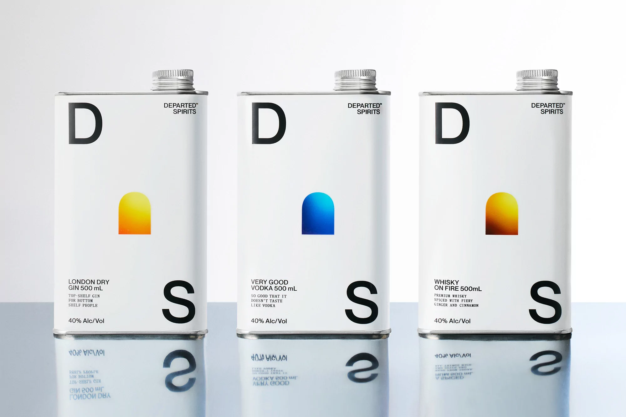 Three white cans of Departed Spirits brand gin, vodka, and whiskey are displayed on a reflective surface against a white background.