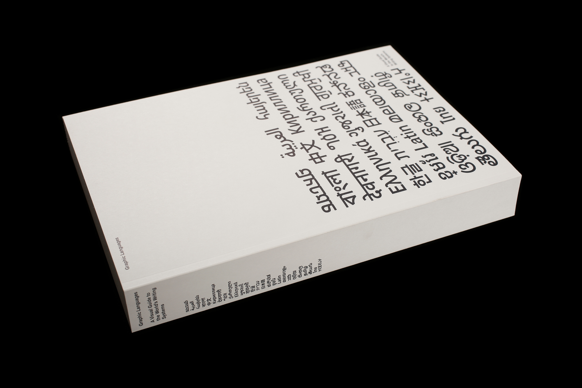 Book cover featuring multilingual typography. The book titled 'Graphic Languages: A Visual Guide to the World's Writing Systems'.