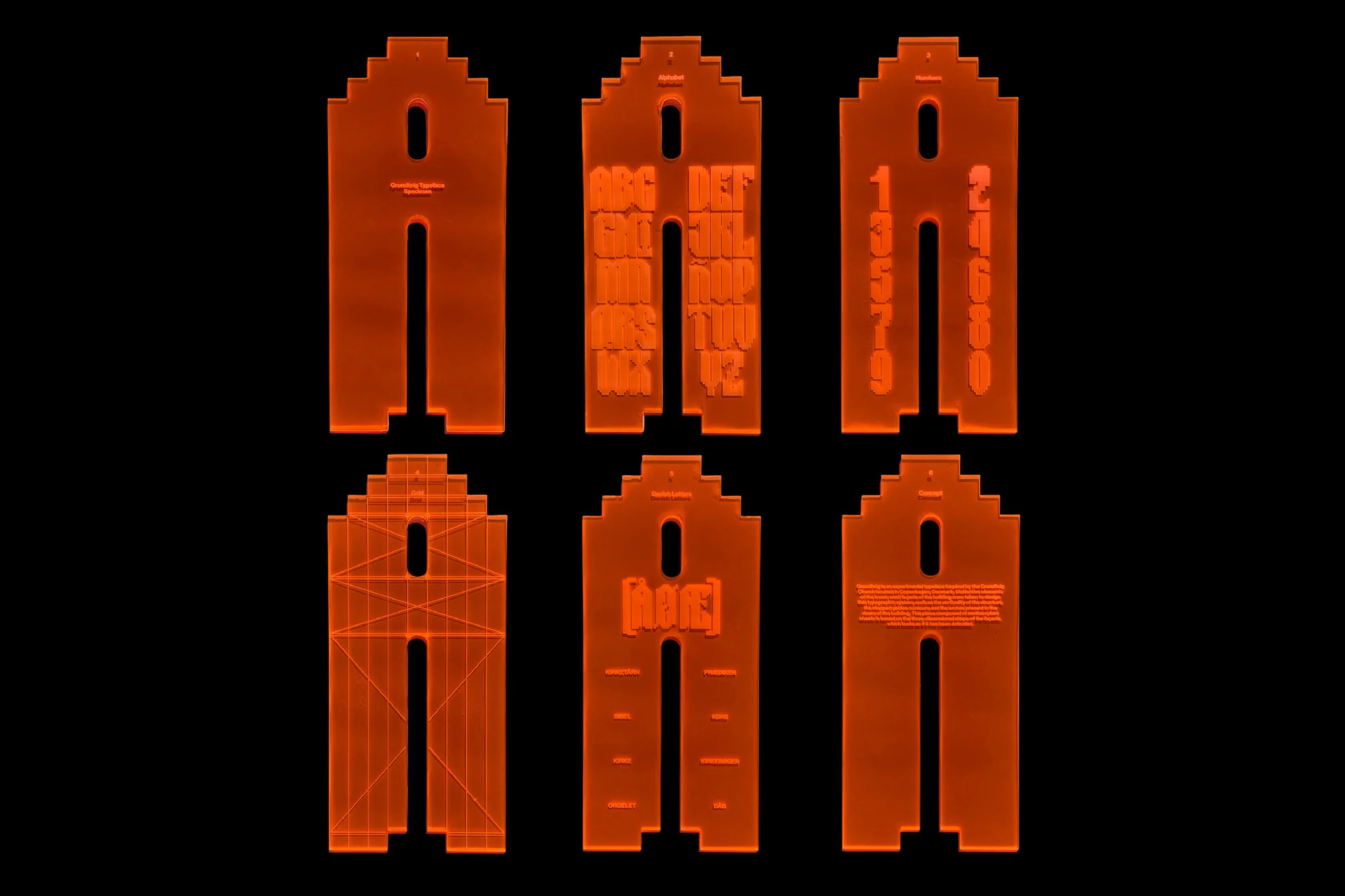 Geometric orange stencils of letterforms and numbers with grid, against black. Useful for crafts, design, and stencil art projects.