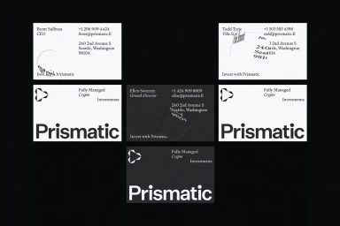 Multiple black and white business cards featuring the Prismatic corporate brand identity and typography design.