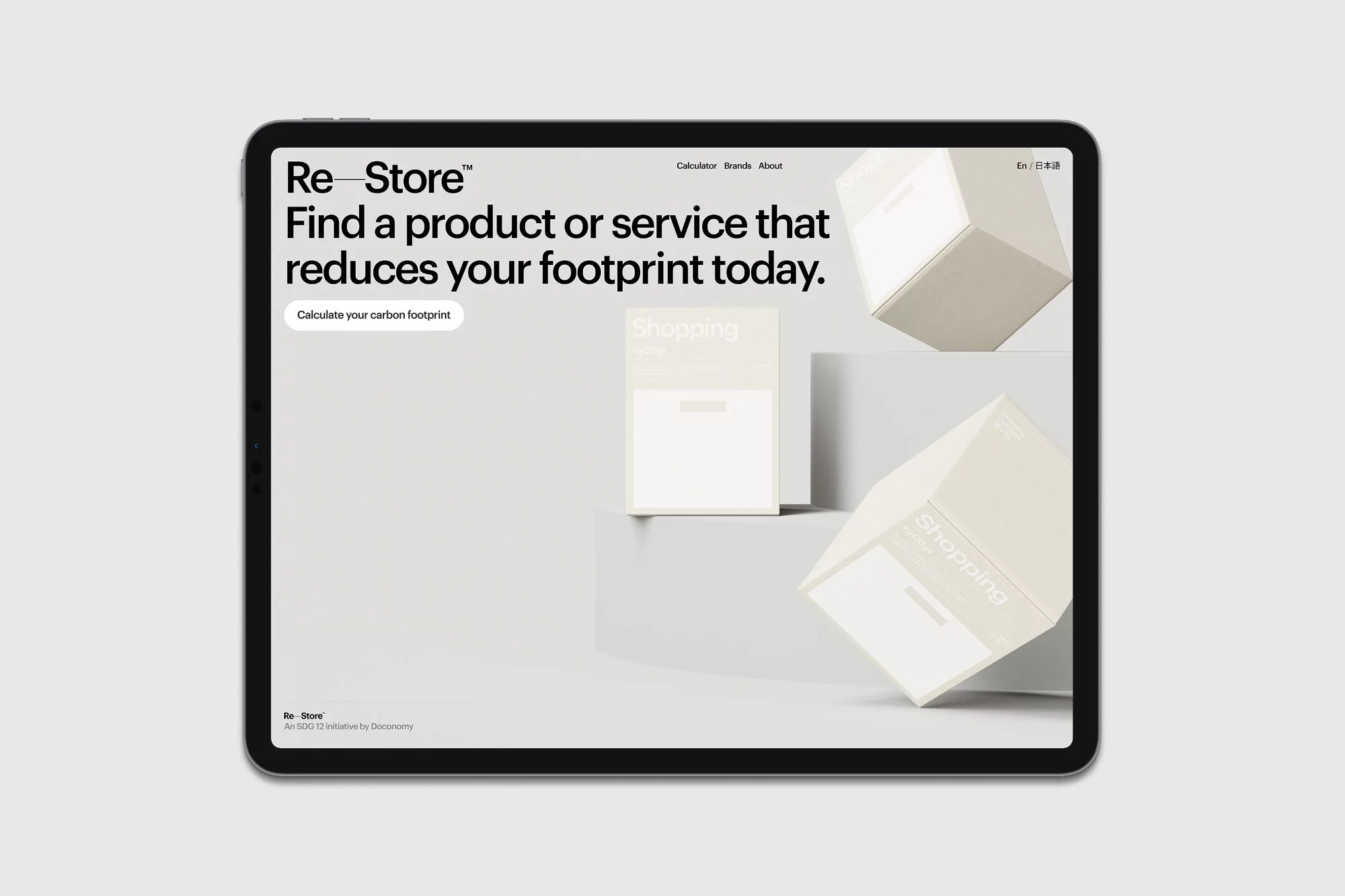 A tablet displays the Re-Store website with white product boxes, set against a neutral background, highlighting digital interface design.