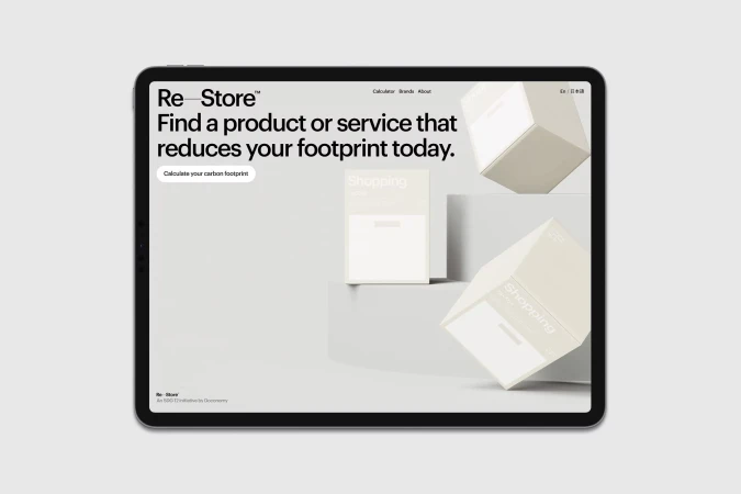 A tablet displays the Re-Store website with white product boxes, set against a neutral background, highlighting digital interface design.