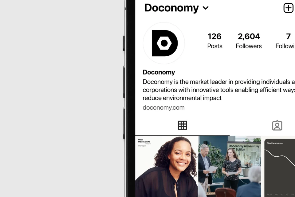 Doconomy's Instagram page on a smartphone screen displays posts, followers, and company information. A feed of images is visible.