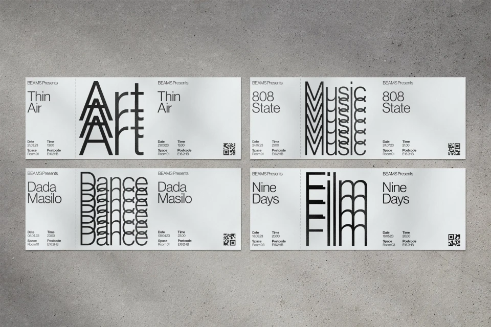 Four white event tickets for art, dance, film, and music events on a grey surface. The black typography gives the tickets a modern look.