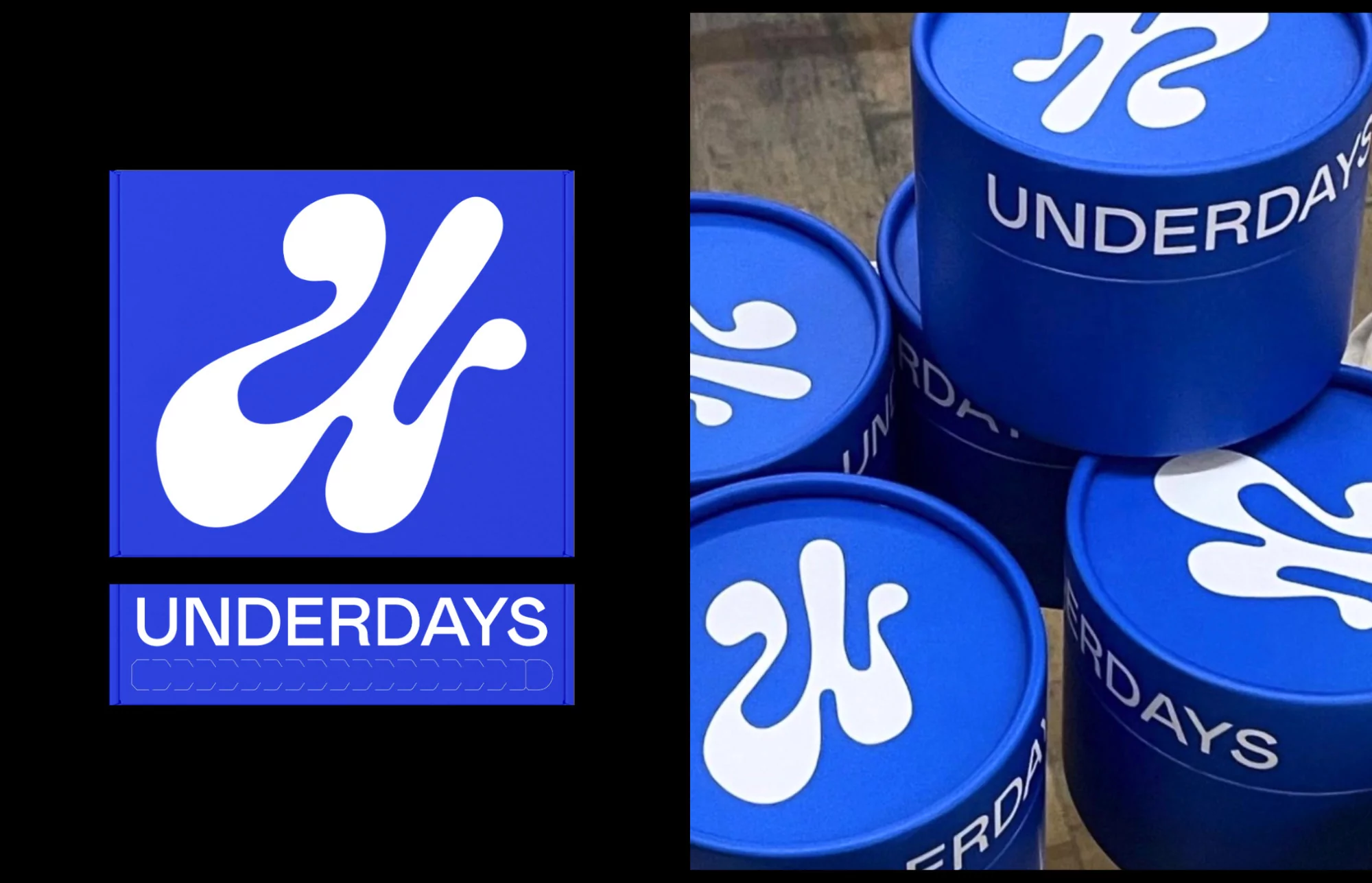 Eye-level studio shot of blue cylindrical boxes stacked with white logos and 'UNDERDAYS' text against a stark black backdrop on the left.