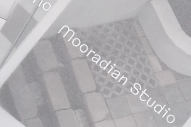 Close-up image of stacked semi-transparent frosted cards displaying clean typography and branding elements.