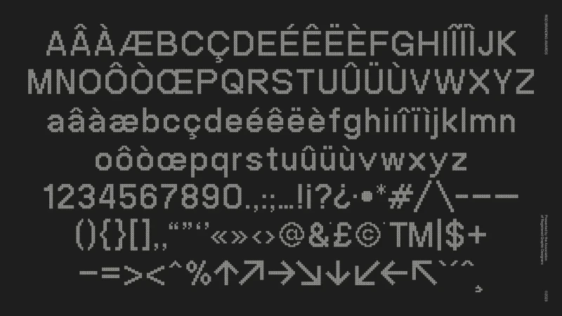 Knitted alphabet and characters in shades of grey, providing a unique, textured take on classic typography against dark grey backdrop.