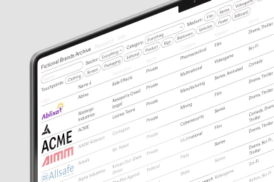 Laptop screen showing a database UI for Fictional Brands Archive with search filters and company logotypes