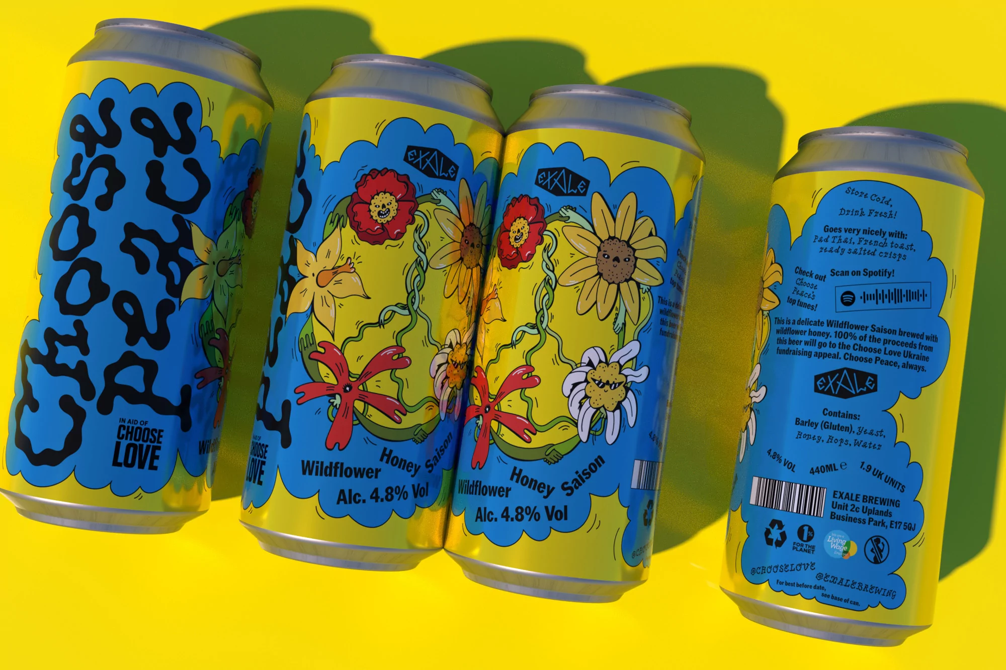 Four yellow Exale beer cans, adorned with blue, red, and yellow flower illustrations, are arranged on a bright yellow surface, in studio lighting.