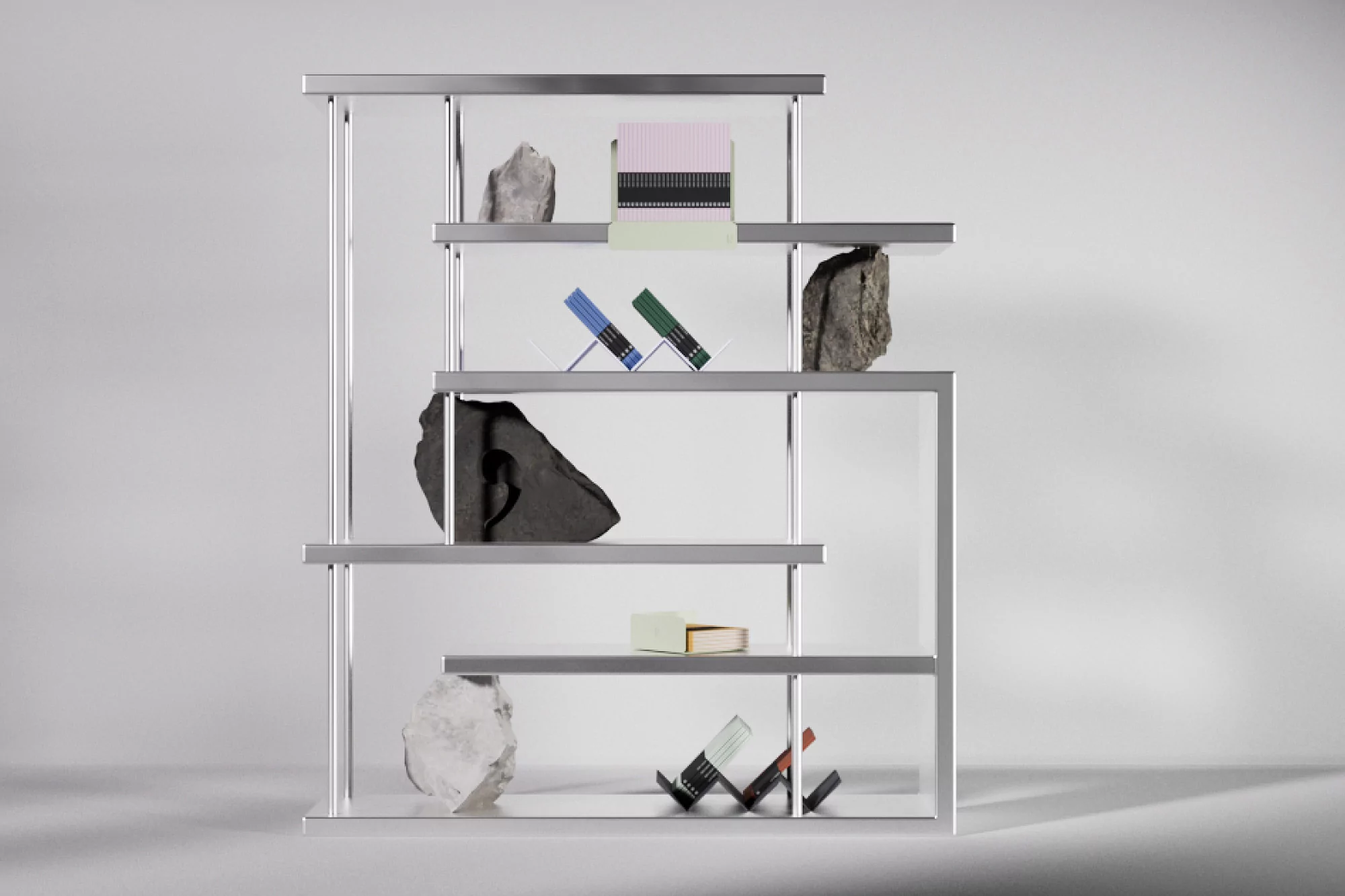 Minimalist interior design featuring a silver metal shelving unit with books, gemstones, and decorative objects against a plain white background.