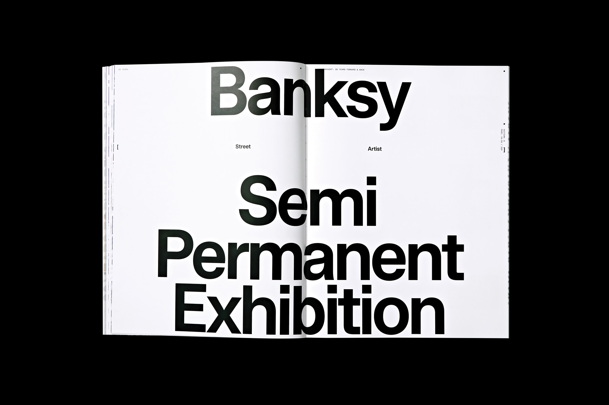Open book spread featuring bold typography, text 'Banksy Street Artist Semi Permanent Exhibition' on a white background, graphic design.