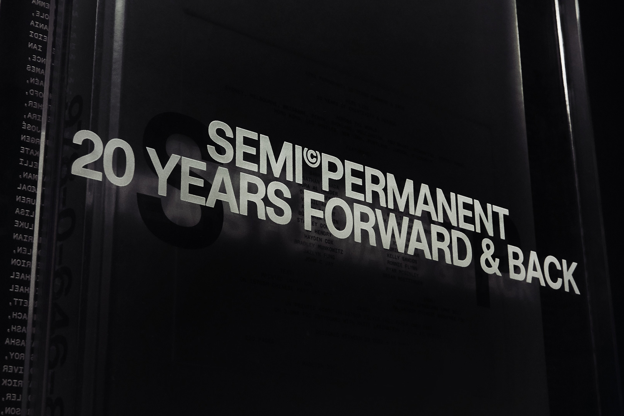 Text graphic featuring '20 Years Semi Permanent Forward & Back' with a dark monochrome color scheme, creating an eye-catching typographic display.