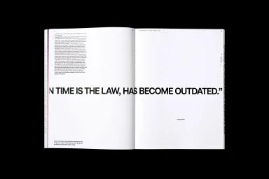 Open magazine spread by Semi Permanent showing bold editorial typography and columns of text on white paper pages.