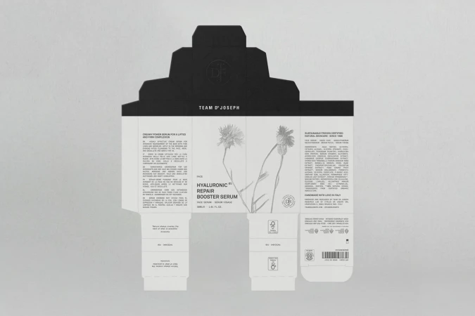 Product packaging for Team D'Joseph hyaluronic repair booster serum. The carton is white with black text and botanical illustrations.