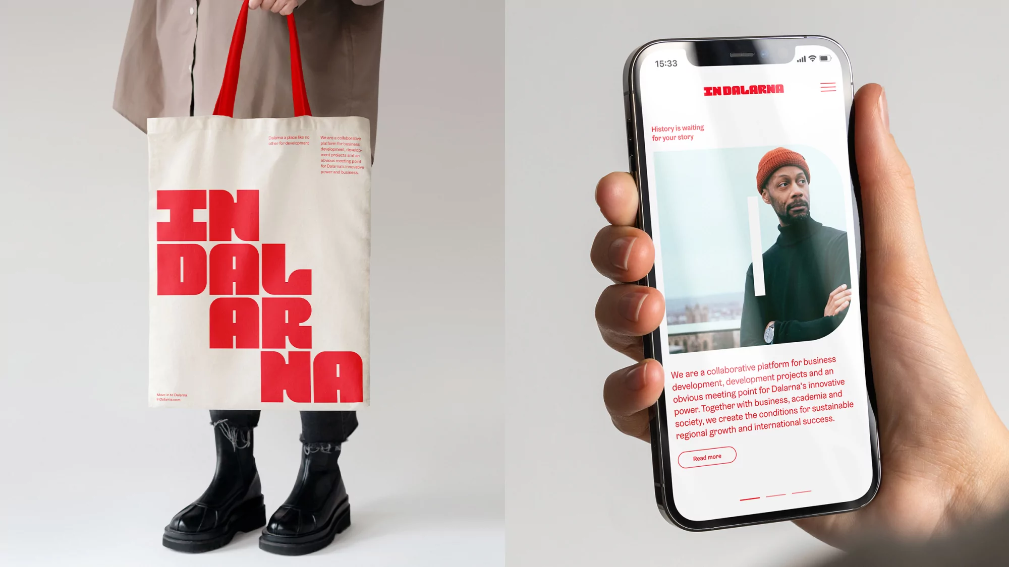 Tote bag with IN DALARNA logo held next to iPhone showing website featuring a man, against a plain white background in studio lighting.
