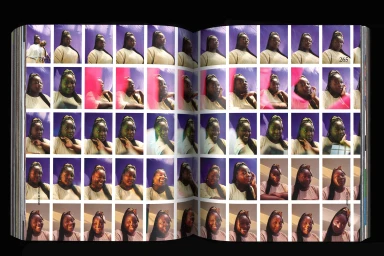 Spread of a photo book displaying a grid of repeating portrait photographs of a Black woman against a purple backdrop.