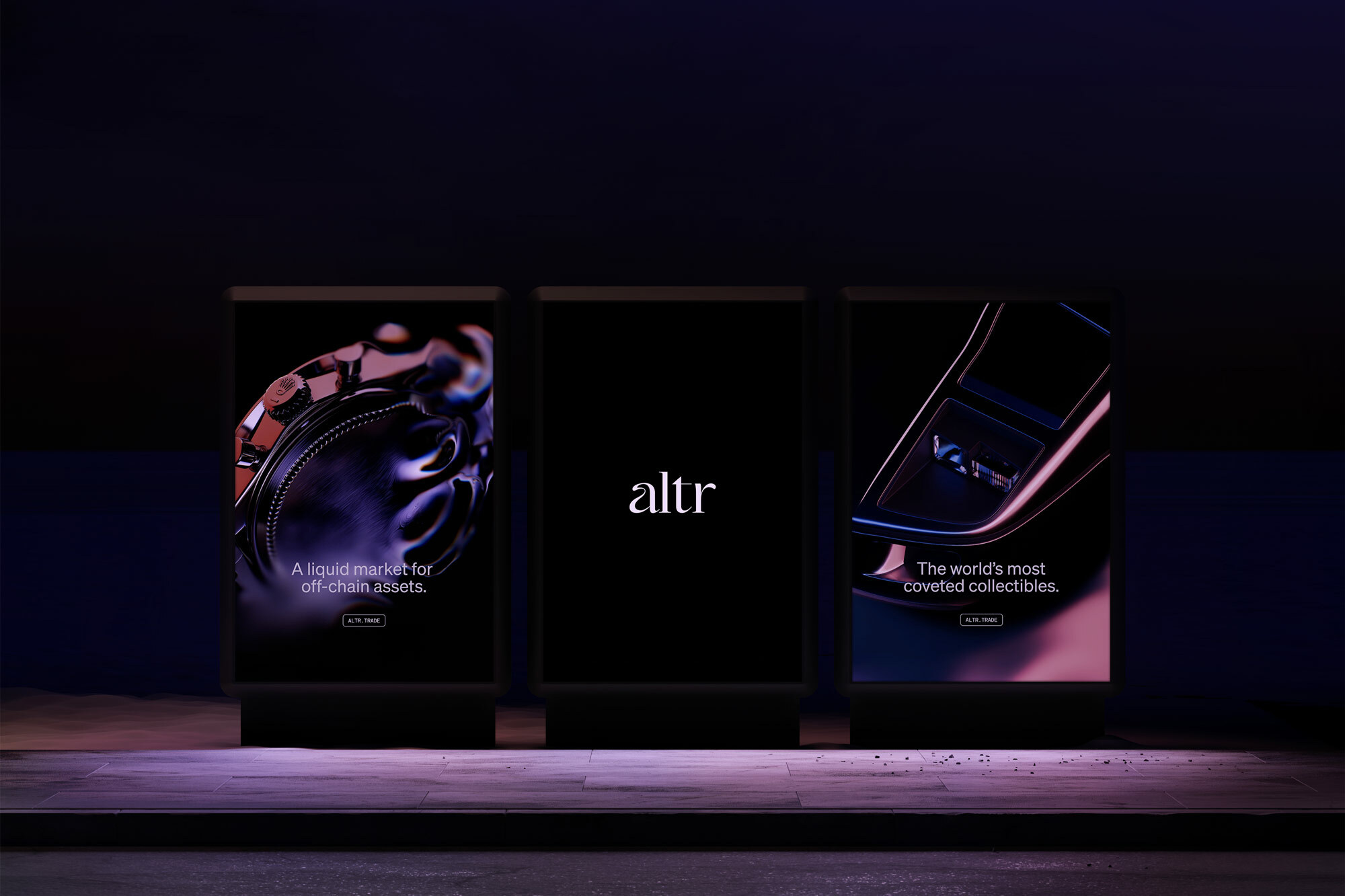 Nighttime view of three illuminated Altr brand advertising displays, showcasing luxury watch and car collectibles, set on a dark urban street.