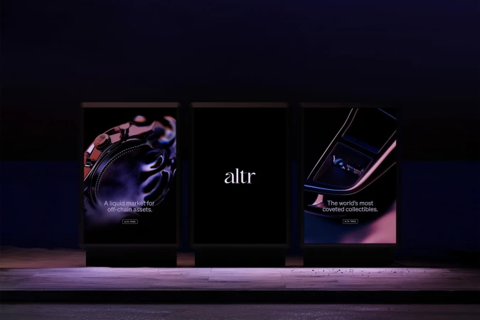 Nighttime view of three illuminated Altr brand advertising displays, showcasing luxury watch and car collectibles, set on a dark urban street.