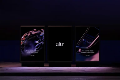 Three illuminated digital billboards displaying Altr brand identity in a dark urban environment at night.