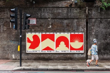 A woman walking a small white dog past a BEYA brand identity billboard mounted on a weathered brick wall on a city street.