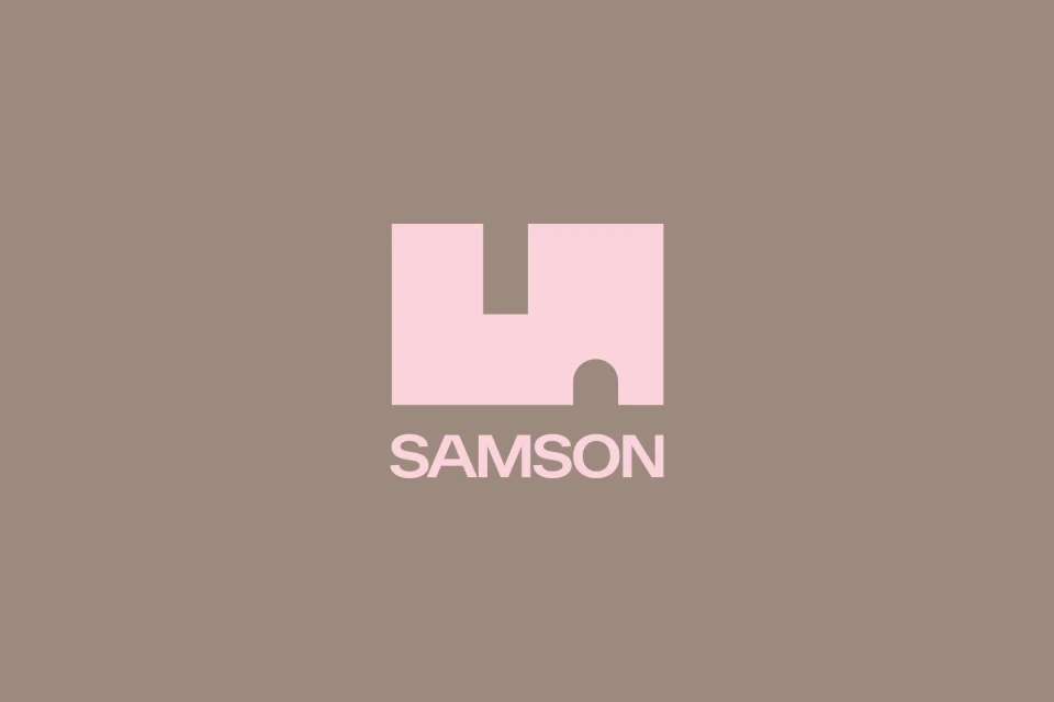 Abstract logo art of a pink Samson logo with a geometric design element on a gray-taupe background, design symbol.