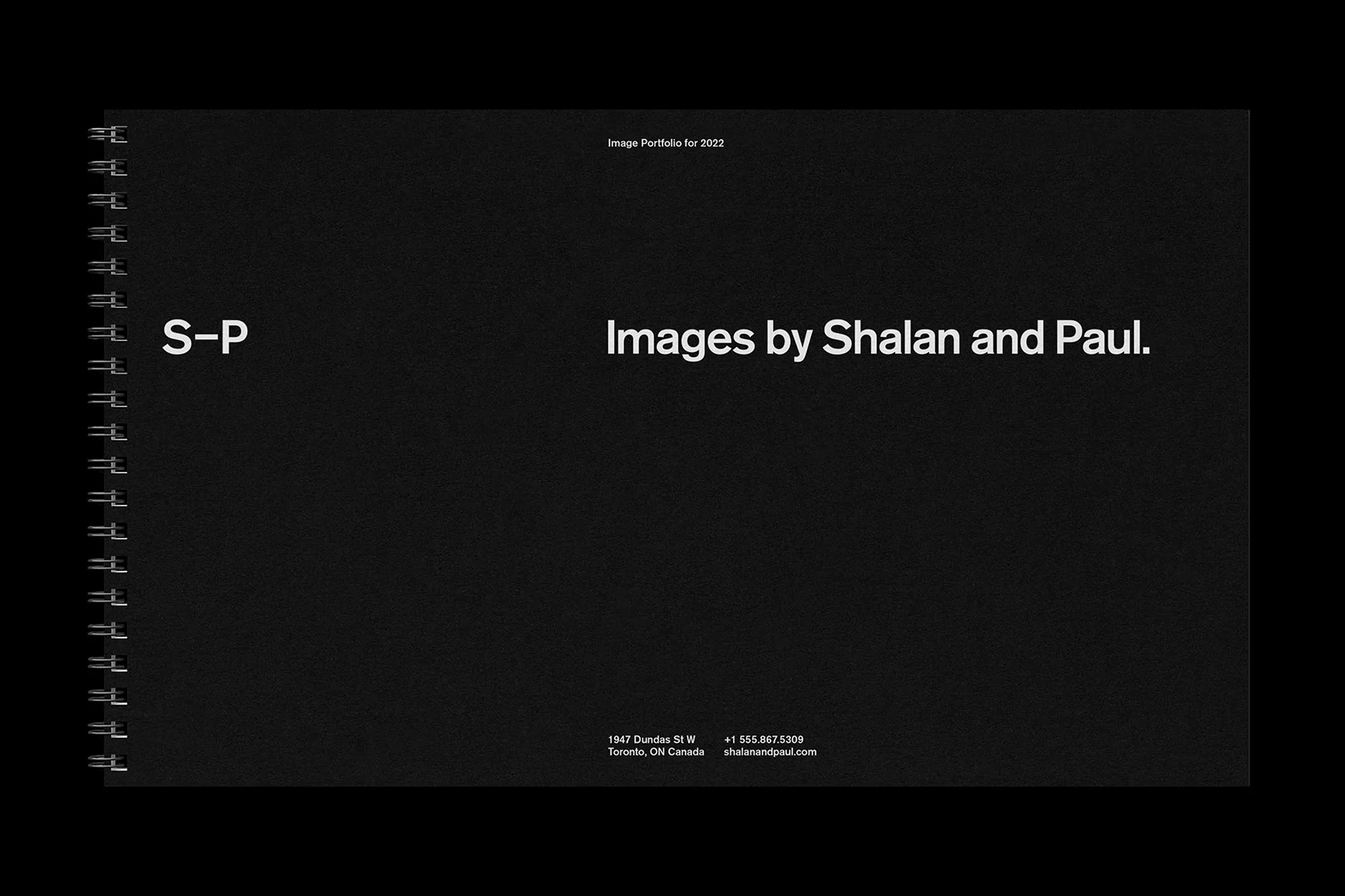Black cover of an image portfolio for 2022, featuring the text 'Images by Shalan and Paul' and contact information in a minimalist design.