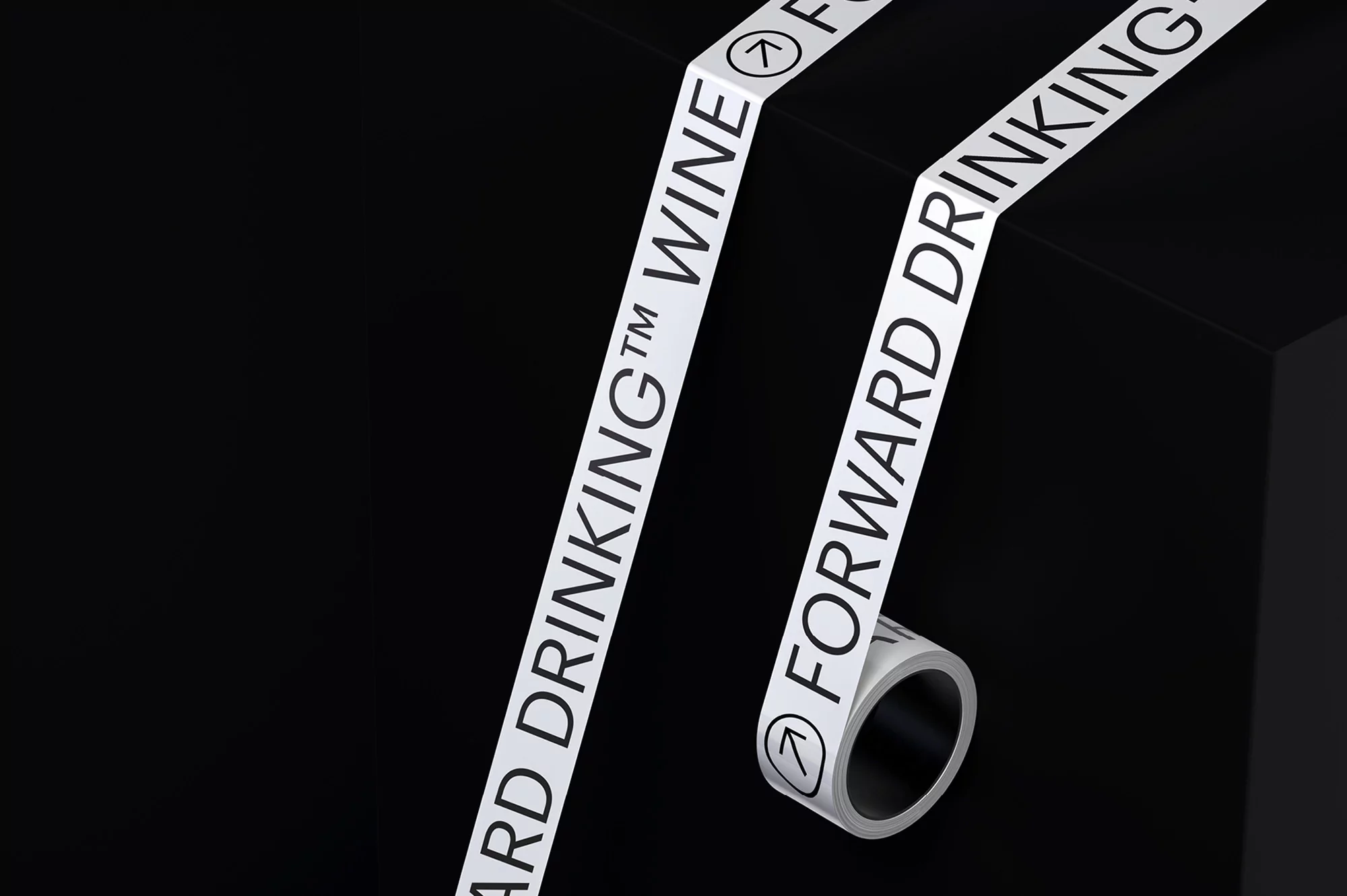 Roll of 'Forward Drinking Wine' printed tape on a black background, angled for visual interest, product-focused studio photography.