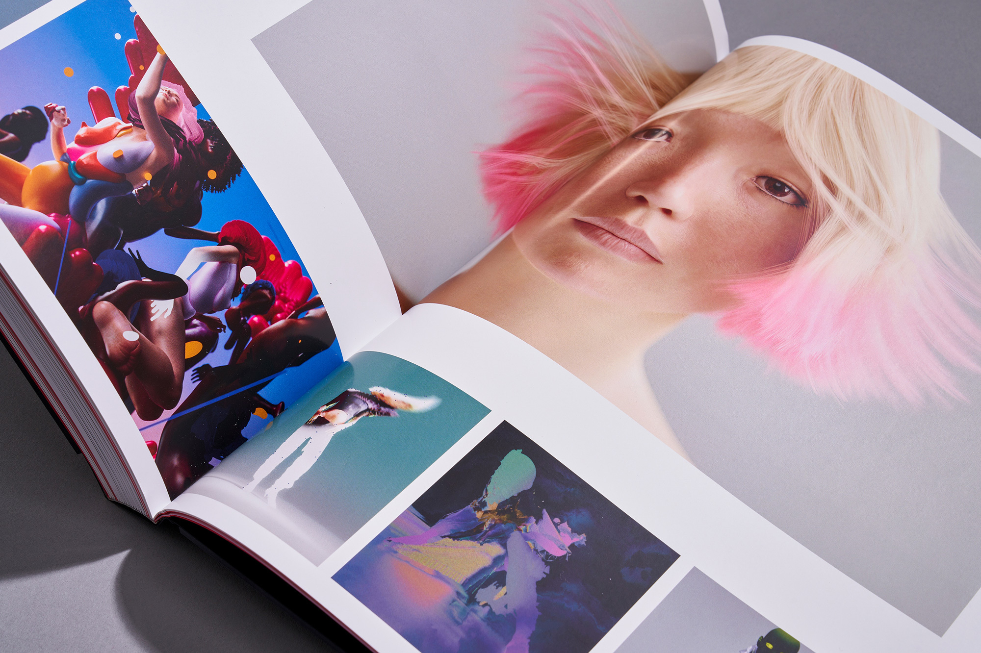 Open book displays a portrait of a woman with pink-tipped hair and artwork featuring figures and abstract designs, showcasing visual content.