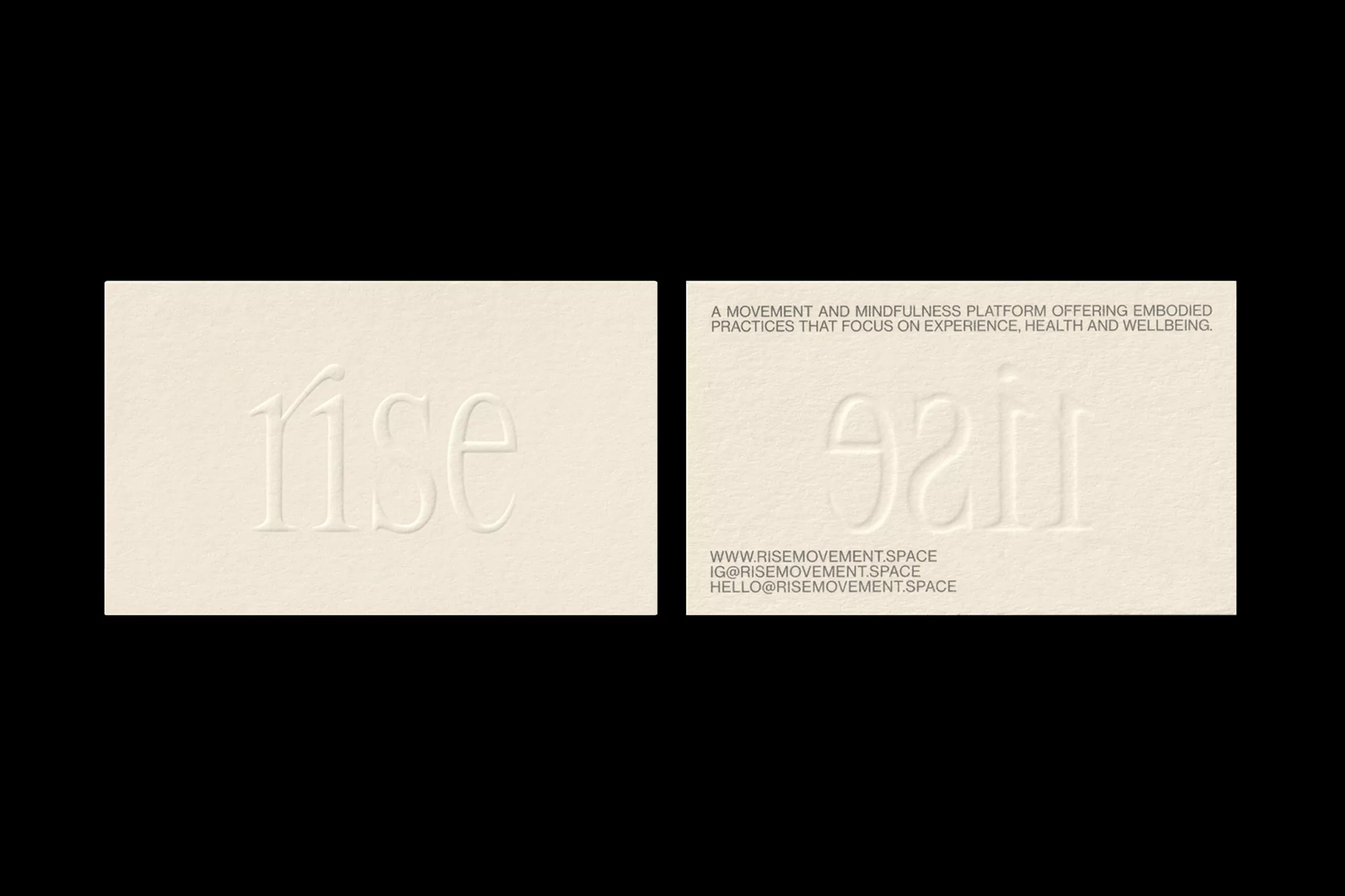 Minimalist business cards featuring embossed 'rise' text, clean design, and neutral cream tones, creating a sophisticated, professional aesthetic.