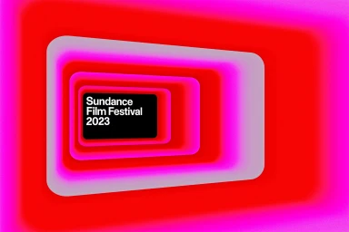 Vibrant glowing pink and red nested rectangular frame tunnel with festival branding
