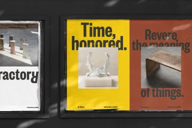 Framed posters showcasing Refractory brand identity with typography and product photography against a dark wall