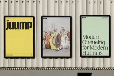 Three framed posters mounted on a light vertical paneled wall displaying the Juump brand identity, typography, and historical illustration.