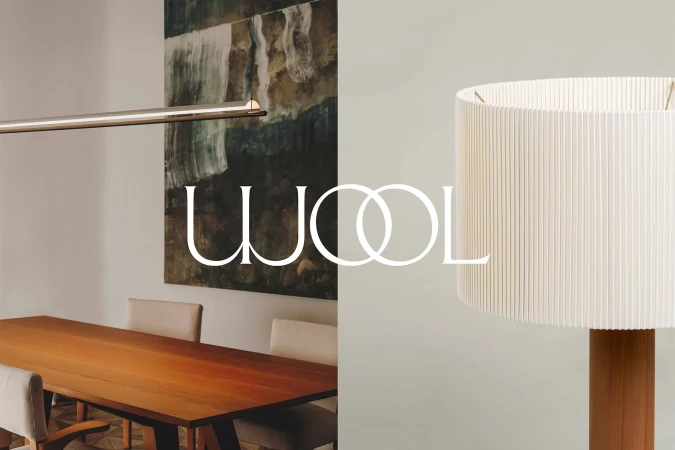 Modern interior shot features a wooden dining table with chairs, a stylish floor lamp, and an abstract painting on the wall.