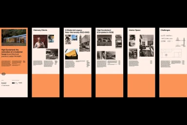 Exhibition panels showcasing architectural restoration and modernism with bold orange blocks and typography